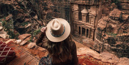 Women looking down at the Wonder of the World in Petra, Jordan