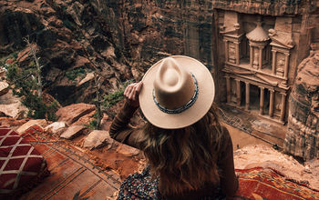 Women looking down at the Wonder of the World in Petra, Jordan