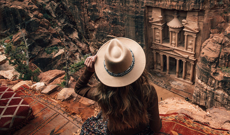 Women looking down at the Wonder of the World in Petra, Jordan