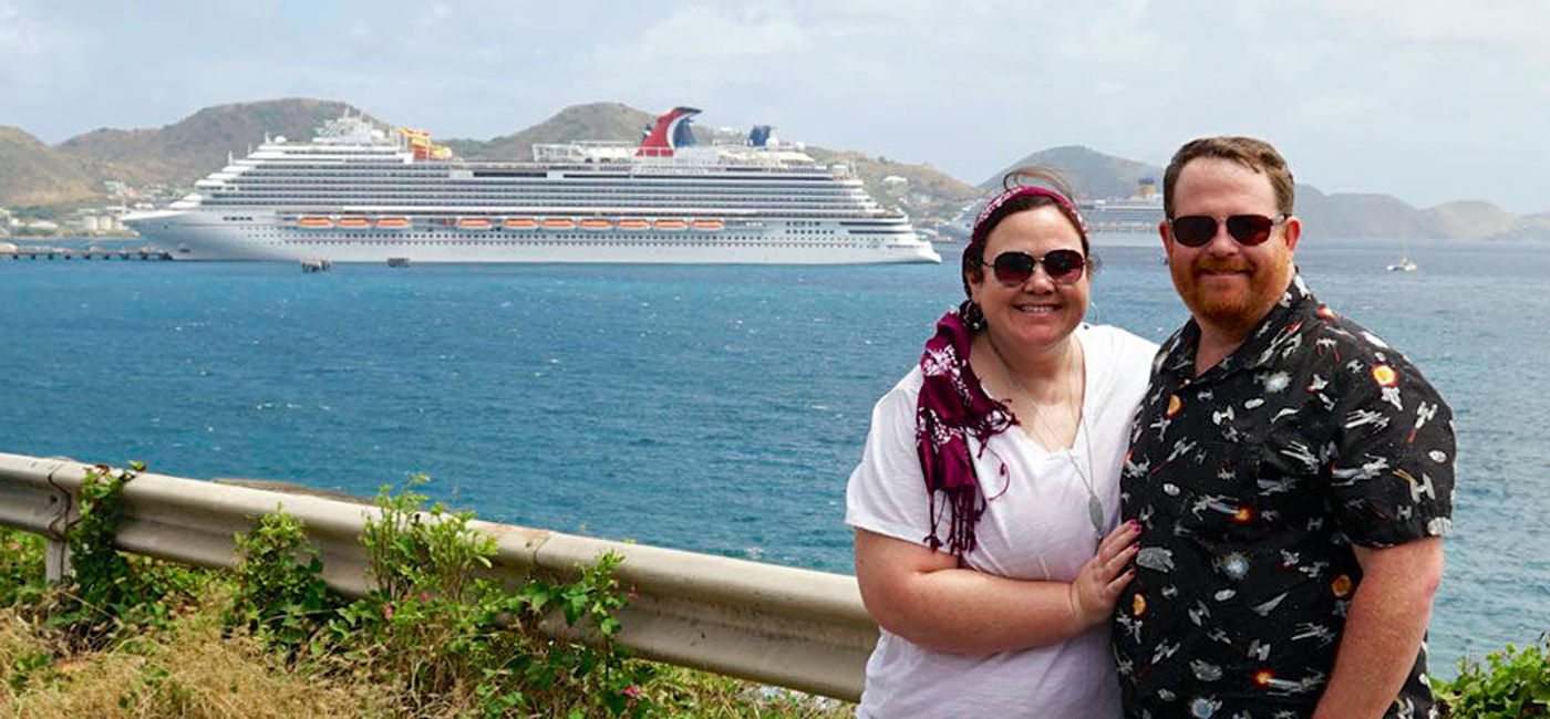 Image: PHOTO: Authors Jason and Heidi Leppert in St. Kitts with the Carnival Vista in the distance. (Photo by Jason Leppert)