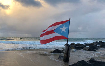 Puerto Rico flag on beach