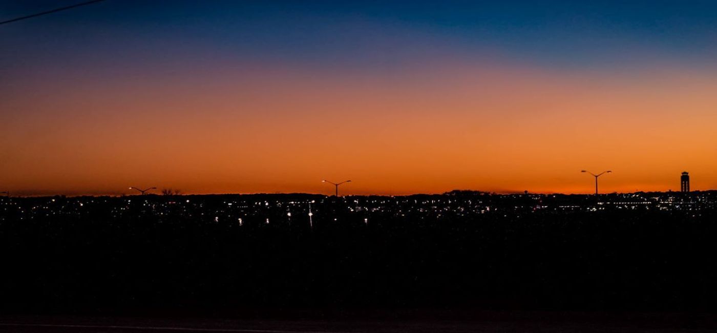 Image: PHOTO: Milwaukee Mitchell International Airport at dusk. (photo via flickr/Lea Lovora) (Flickr)