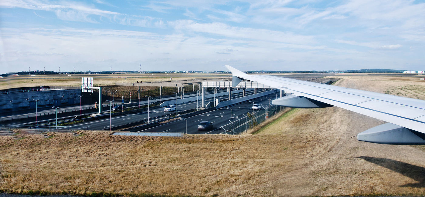 Image: Plane on runway at Charles de Gaulle (photo courtesy FroggyFrogg/iStock/Getty Images Plus)