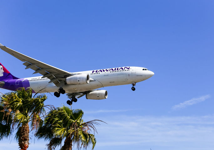 Hawaiian Airlines plane landing at Los Angeles International Airport Hawaiian Airlines plane landing at Los Angeles International Airport