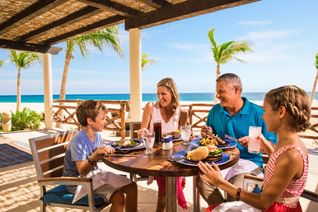 Family dining at La Hacienda Beach Grill at Hyatt Ziva Los Cabos