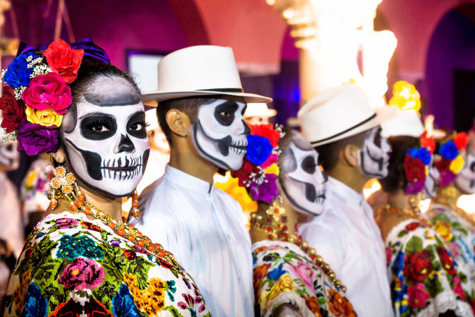 Painted dancers on Dia de Muertos in Merida, Yucatan, Mexico.