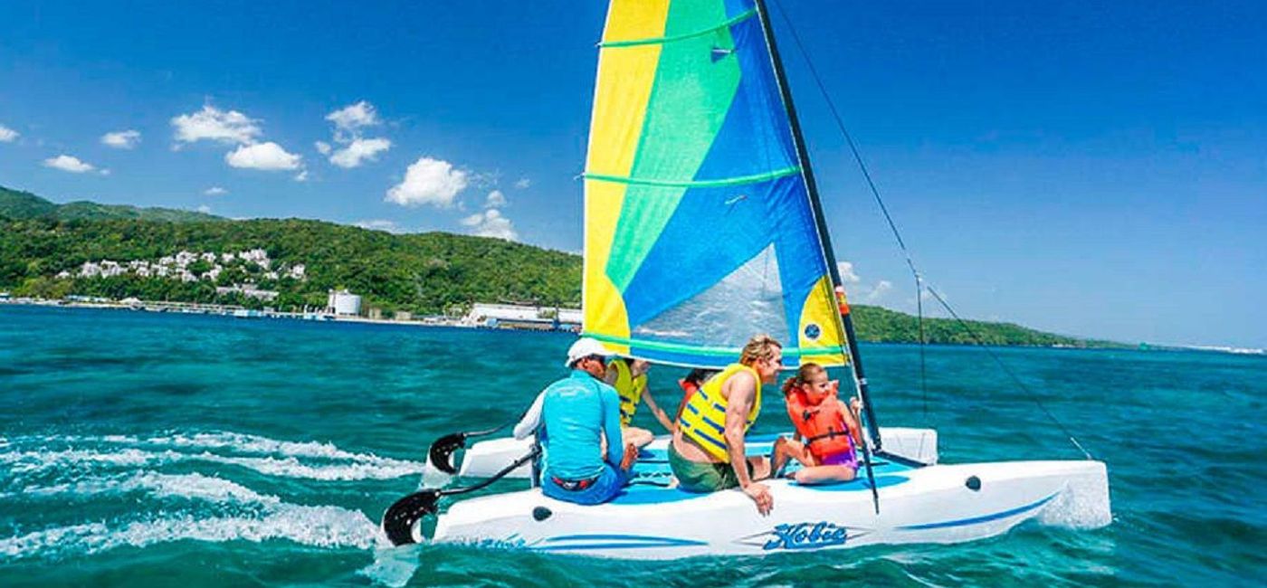 Image: A family enjoying time on the water at Moon Palace Jamaica. (photo via Palace Resorts)