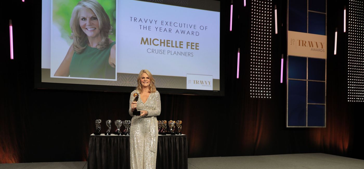 Image: Michelle Fee, CEO and Founder of Cruise Planners, is awarded the 2021 Travvy Executive of the Year award (Northstar Travel Group)