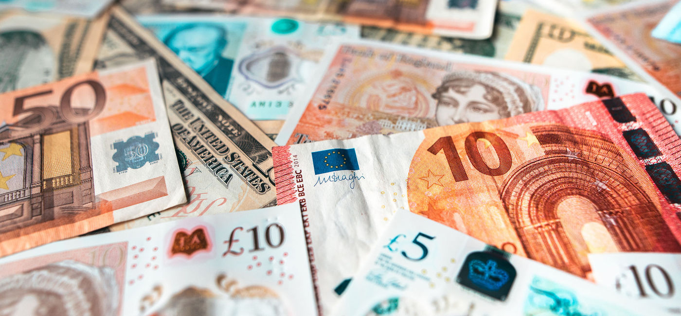 Image: Mixed bills of different global currencies. (Photo via iStock/Getty Images Plus/MarioGuti)