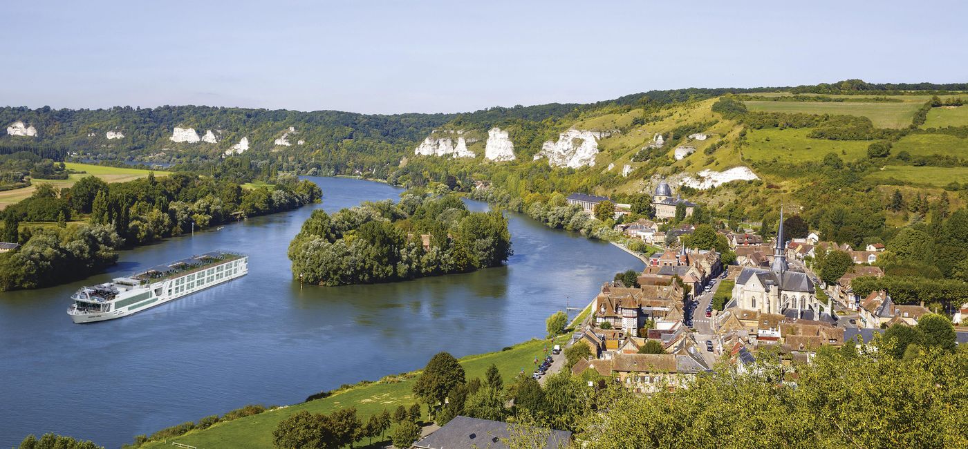 Image: PHOTO: The Scenic Gem sails alongside Normandy. (photo courtesy of Scenic)