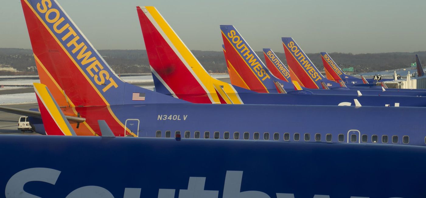 Image: A row of Southwest Airlines planes. (photo via SkyCaptain86/iStock Editorial/Getty Images Plus)