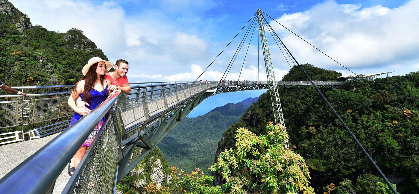 Image: Tourists enjoying the Sky Bridge in Langkawi, Malaysia. (photo via Tourism Malaysia)