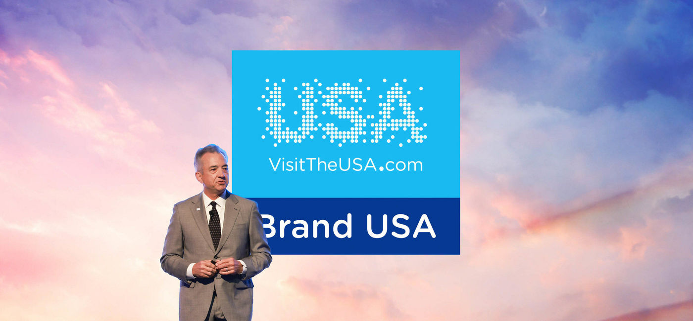 Image: Chris Thompson, president and CEO of Brand USA, speaking at IPW 2023 press conference in San Antonio, Texas. (Photo Credit: Brand USA Media)