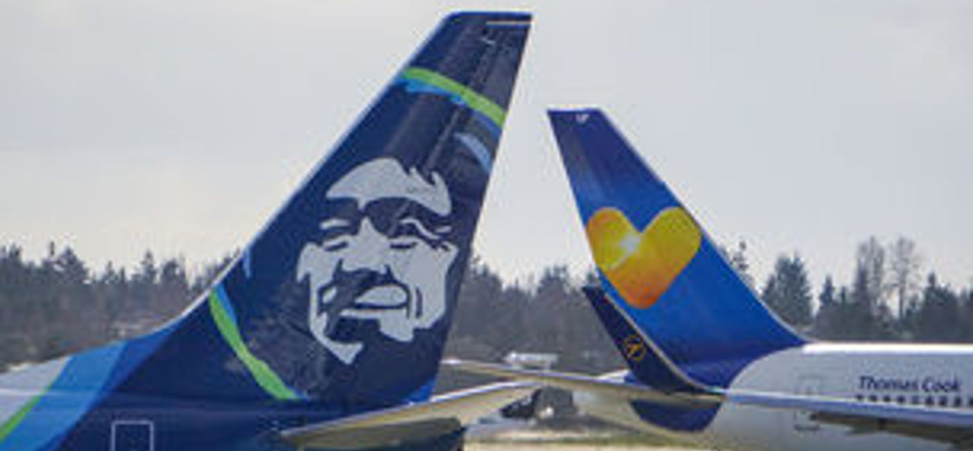 Image: PHOTO: An Alaska Airlines plane and a Condor Airlines plane (Photo courtesy of Condor Airlines) 