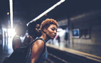Friends waiting for the train at station.