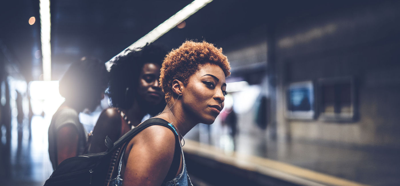 Image: Friends waiting for the train at station. (photo via FG Trade / E+)