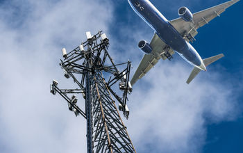 5G mobile service tower with aircraft.