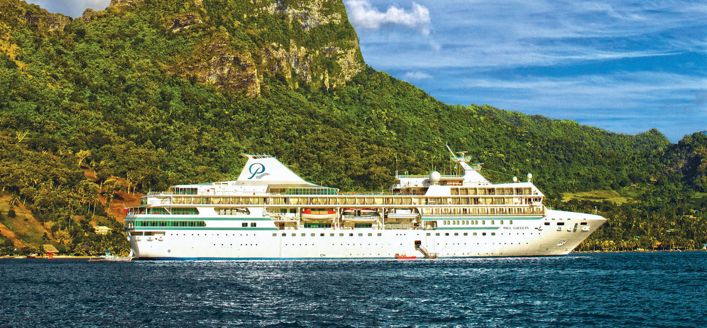 Image: PHOTO: Guests enjoy stunning views aboard the ship. (photo via Paul Gauguin Cruises)