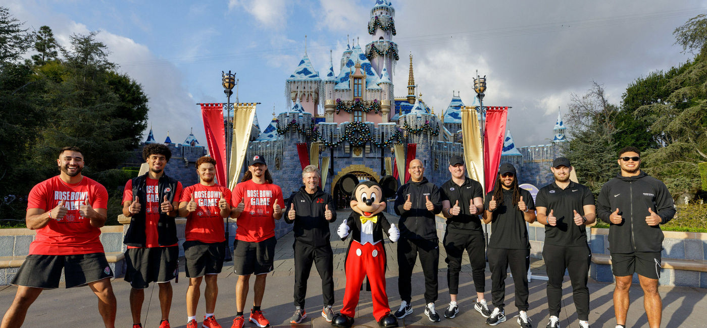 Image: Coaches and players visited Disneyland Park, their first official stop on the way to the 2023 New Year's Rose Bowl Game. (photo courtesy of Disneyland Resort, credit: Sean Teegarden)