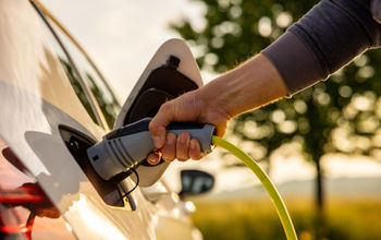 Charging electric vehicle.