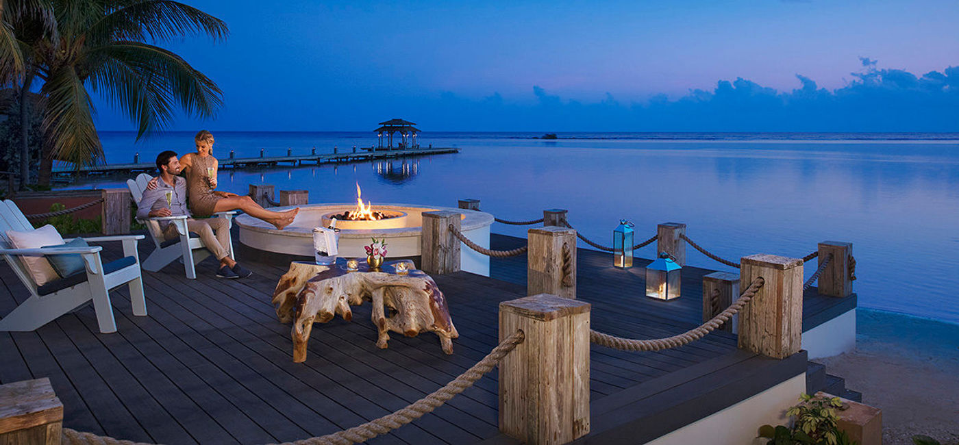 Image: Couple at Coyaba Fire Pit at Zoetry Montego Bay Jamaica. (photo courtesy of AMResorts)