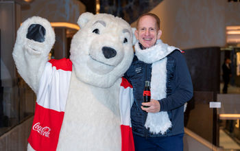 Norwegian Cruise Line&#39;s Harry Sommer with the Coca-Cola polar bear