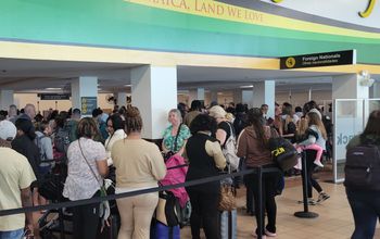 Travelers at Sangster Airport in Montego Bay, Jamaica.