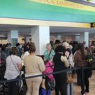 Travelers at Sangster Airport in Montego Bay, Jamaica.