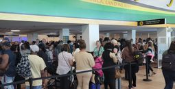 Travelers at Sangster Airport in Montego Bay, Jamaica.