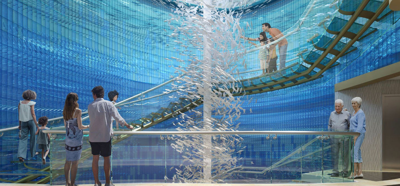 Image: The staircase connecting the two ocean-themed zones on Carnival Jubilee -- Currents and Shores. (Photo Credit: Carnival Cruise Line)