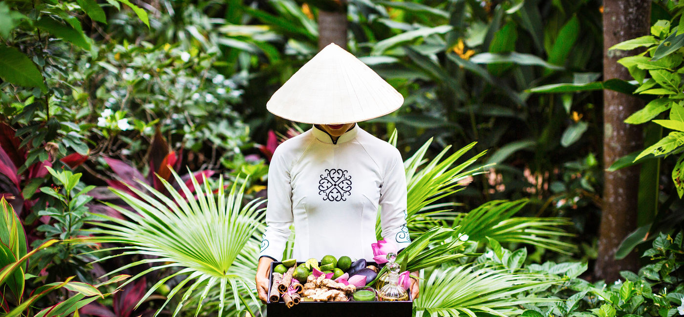 Image: A hotel worker in the garden of La Veranda Phu Quoc - MGallery, Vietnam. (photo via Accor Hotels and Aaron Joel Santos) ((photo via Accor Hotels and Aaron Joel Santos))