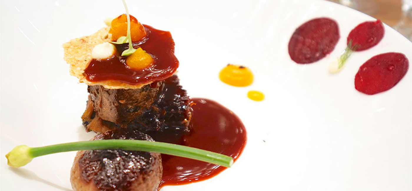 Image: PHOTO: Slow Cooked Crispy Lamb at The Chef's Table on Carnival Cruise Line's Carnival Vista. (Photo by Jason Leppert)