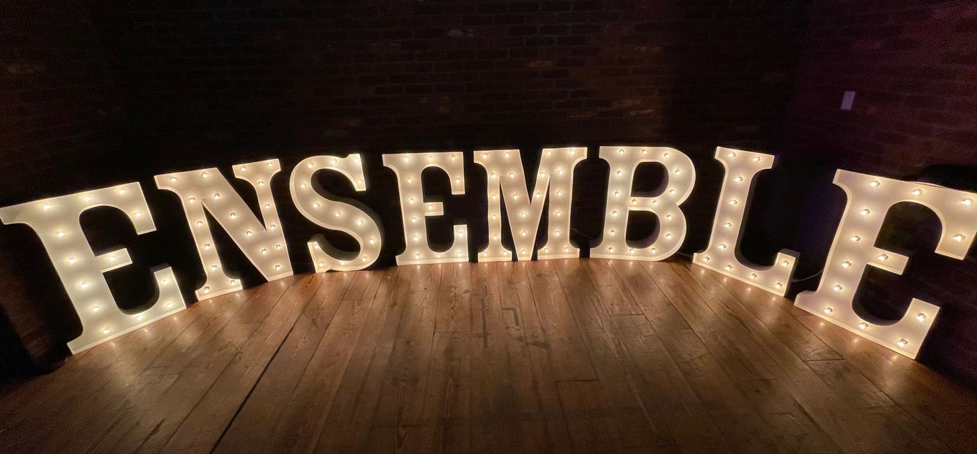 Image: Ensemble in lights. (Photo Credit: Bruce Parkinson)