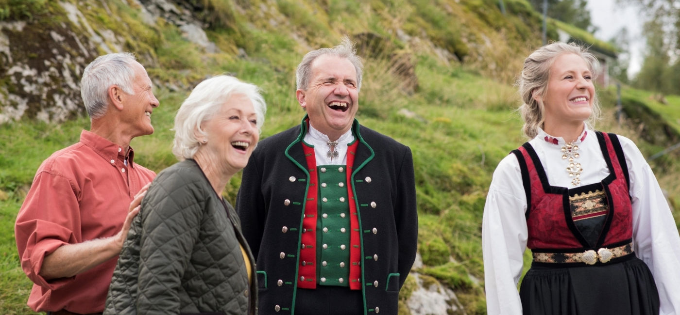 Image: Travelers at a MAKE TRAVEL MATTER experience at the Ovre Eide Farm in Bergen, Norway.  (Photo Credit: TTC Tour Brands)