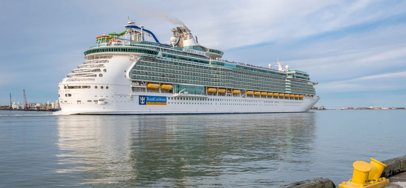 Image: Royal Caribbean ship leaving port. (photo via philinnz4/iStock Editorial/Getty Images Plus)