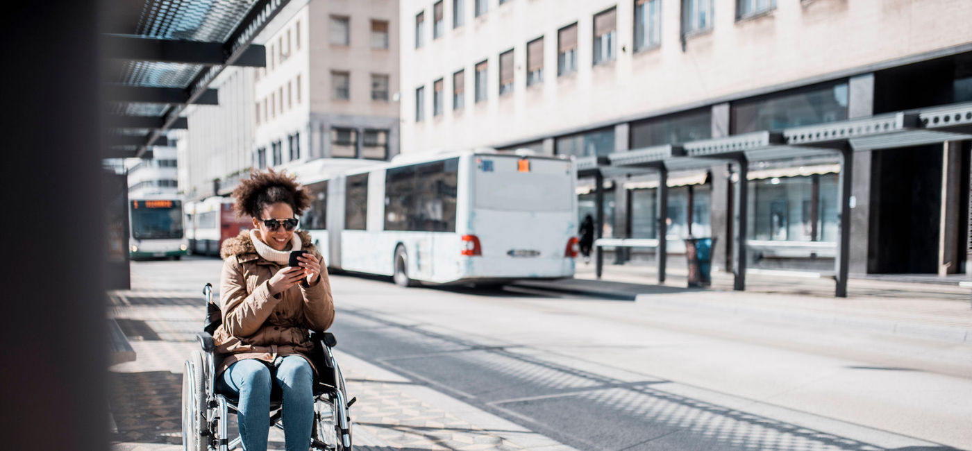 Photo: PHOTO: Woman in a wheelchair waiting on the bus. (photo via AzmanJaka/E+)