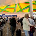 A view of Global Entry kiosks through a long line at Dallas Fort Worth airport