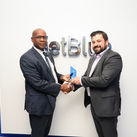 Grenada Tourism Minister Lennox Andrews with Eric Friedman, Director of Route Planning, JetBlue