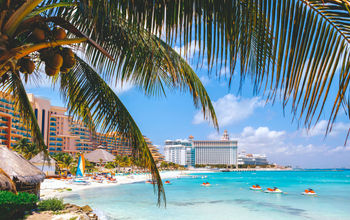 Cancun beach with hotels.