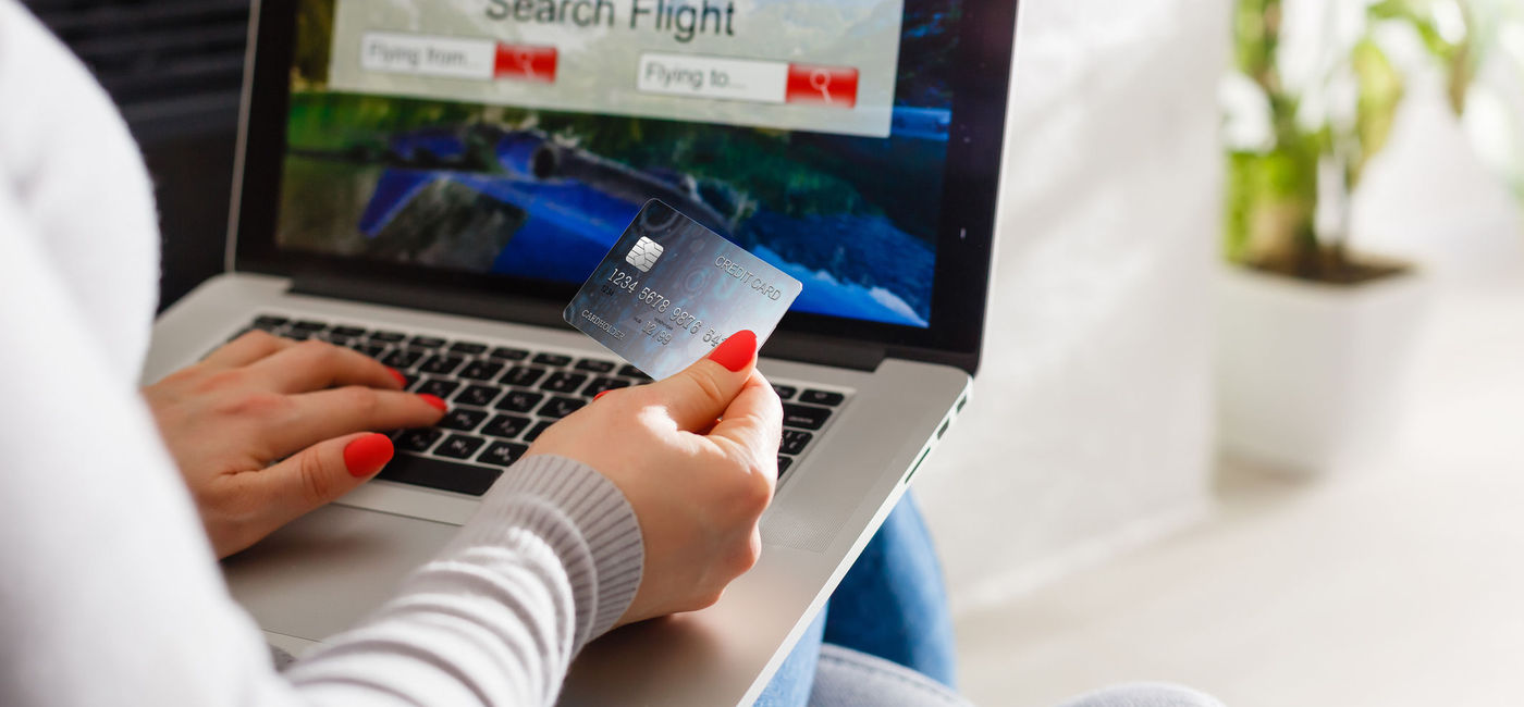 Image: Searching for airfare. (Photos via iStock / Getty Images Plus / Sinenkiy)