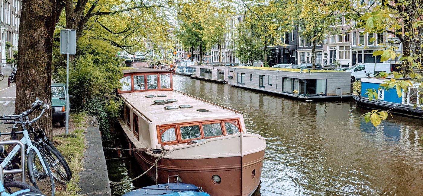 Image: Houseboats along a canal in Amsterdam (Photo via Lauren Bowman)