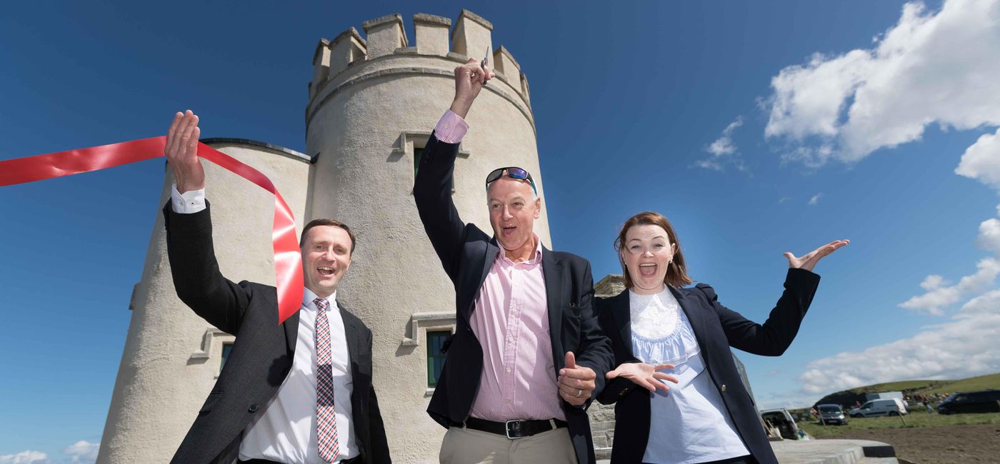 Image: Pictured at O'Brien's Tower is Leonard Cleary, Director of Rural Development, Clare County Council; Bobby Kerr, Chair of Cliffs of Moher Ltd.; and Geraldine Enright, Director of the Cliffs of Moher Visitor Experience. (photo via Eamon Ward) (Cliffs of Moher Visitor Experience)