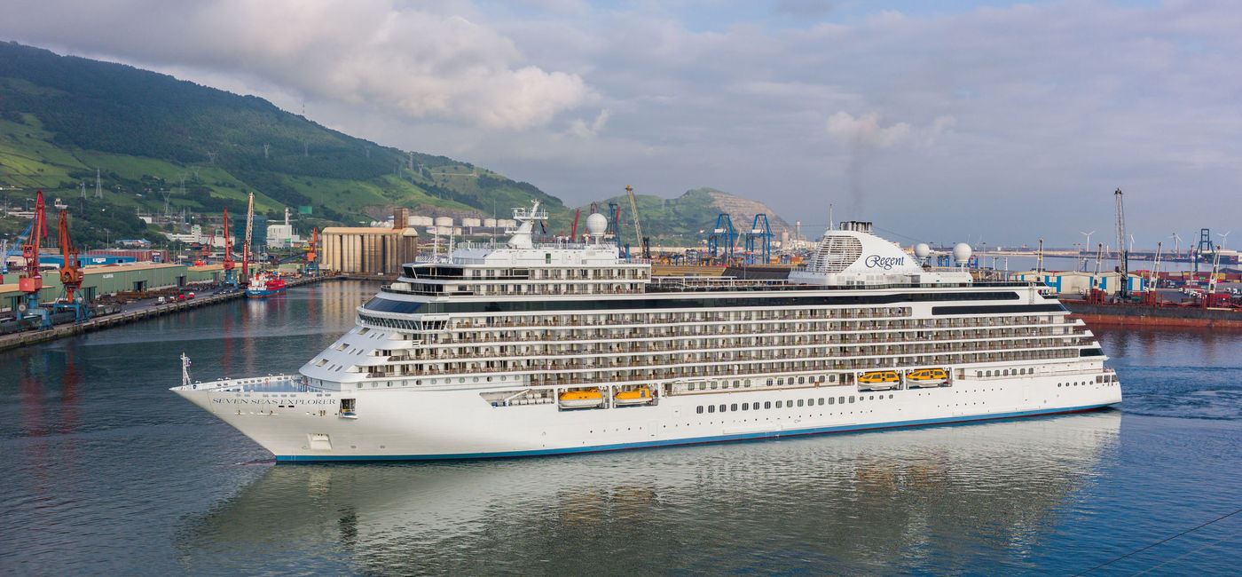 Image: PHOTO: Regent Seven Seas Cruises' Seven Seas Explorer in Bilbao, Spain. (photo via ShaunWilkinson/iStock Editorial/Getty Images Plus)