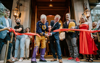 Sir Richard Branson and James Bermingham cut the ribbon to commemorate Virgin Hotels New Orleans' grand opening.
