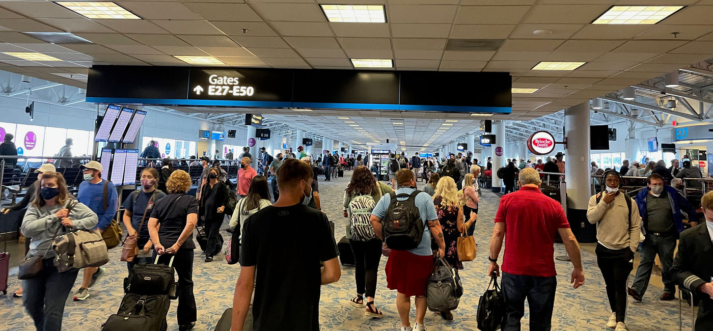 Image: Passengers moving through Charlotte Douglas International Airport. (photo by Patrick Clarke)