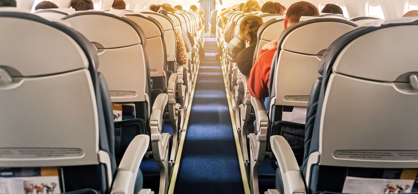 Image: Packed plane during the holidays. (photo via Diy13/iStock/Getty Images)