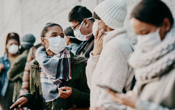 A group wearing face masks amid the COVID-19 pandemic