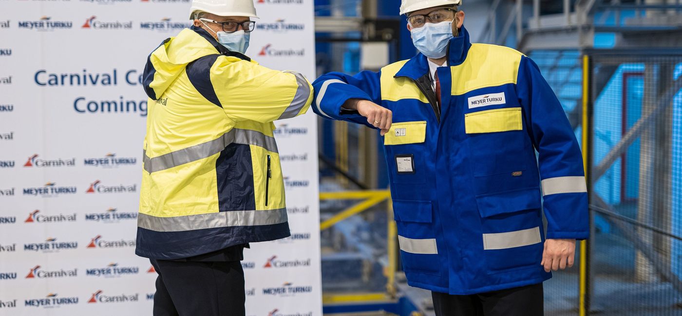 Image: Celebrating the start of construction on Carnival Celebration in Finland are Carnival SVP-Newbuilds Ben Clement, left, and Meyer Turku CEO Tim Meyer. (Photo courtesy of Carnival Cruise Line)