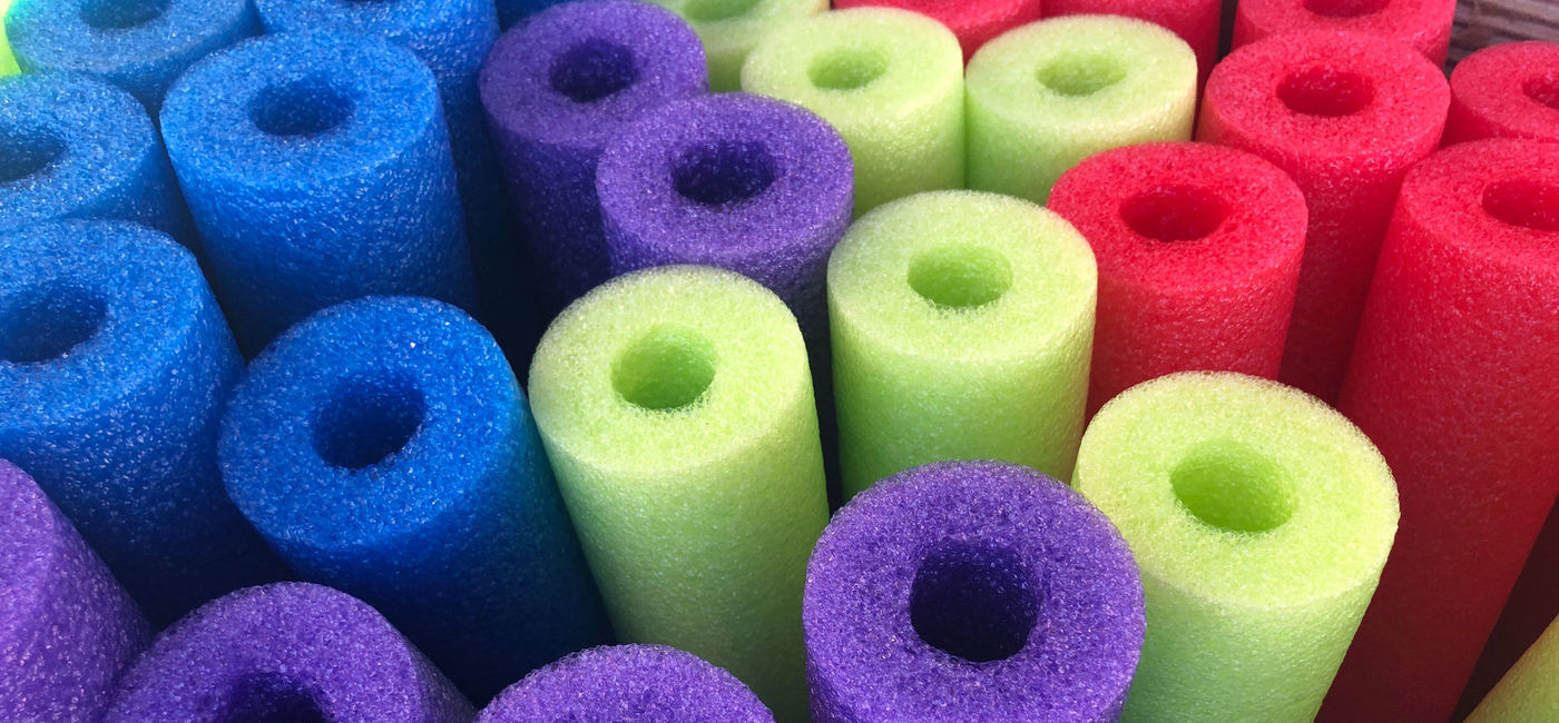 Image: Colorful swim noodles. (photo via iStock/Getty Images Plus/Kameleon007)