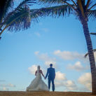 Bride and groom on the beach for a destination wedding. 